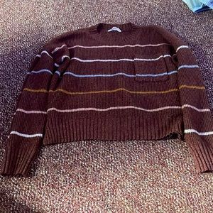 Maroon sweater with pink white blue and yellow stripes